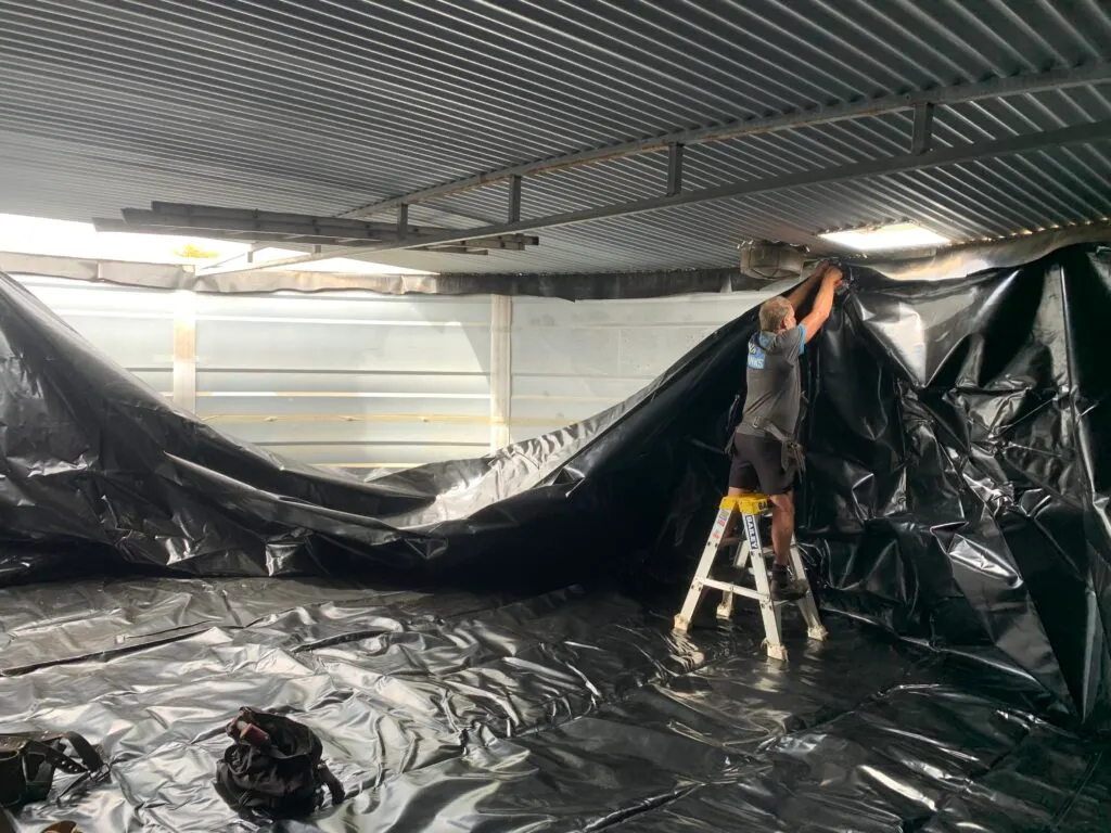 Water tank showing signs of a failing liner